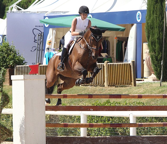 EXC: ATHINA ONASSIS AT THE AREZZO EQUESTRIAN CENTRE