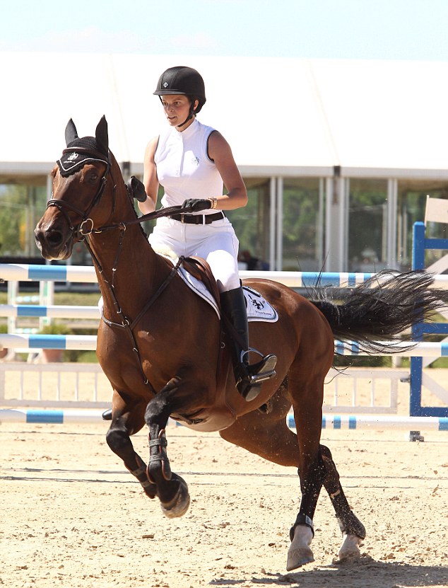 EXC: ATHINA ONASSIS AT THE AREZZO EQUESTRIAN CENTRE