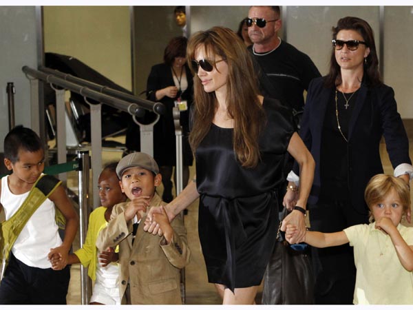 U.S. actress Angelina Jolie arrives with her children Maddox, Zahara, Pax Thien and Shiloh at New Tokyo International Airport in Narita