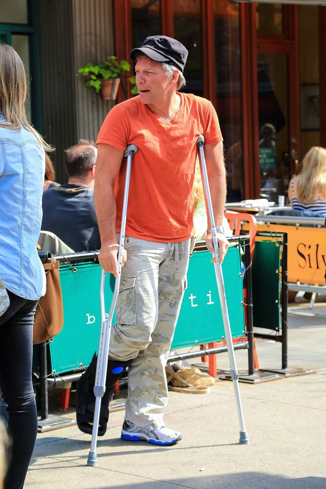 Jon Bon Jovi Is Seen Walking On Crutches And Appears To Have Broken Foot In New York City