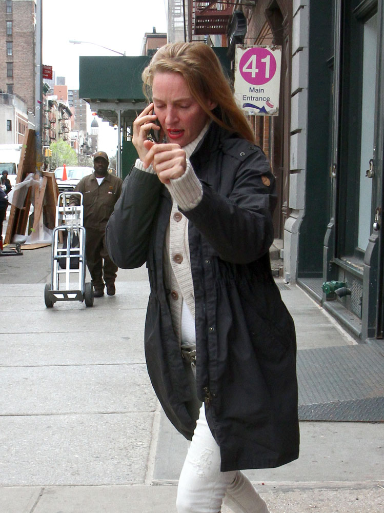 EXCLUSIVE: Uma Thurman steps out without engagement ring in NYC