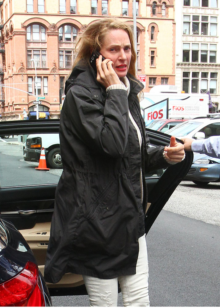 EXCLUSIVE: Uma Thurman steps out without engagement ring in NYC