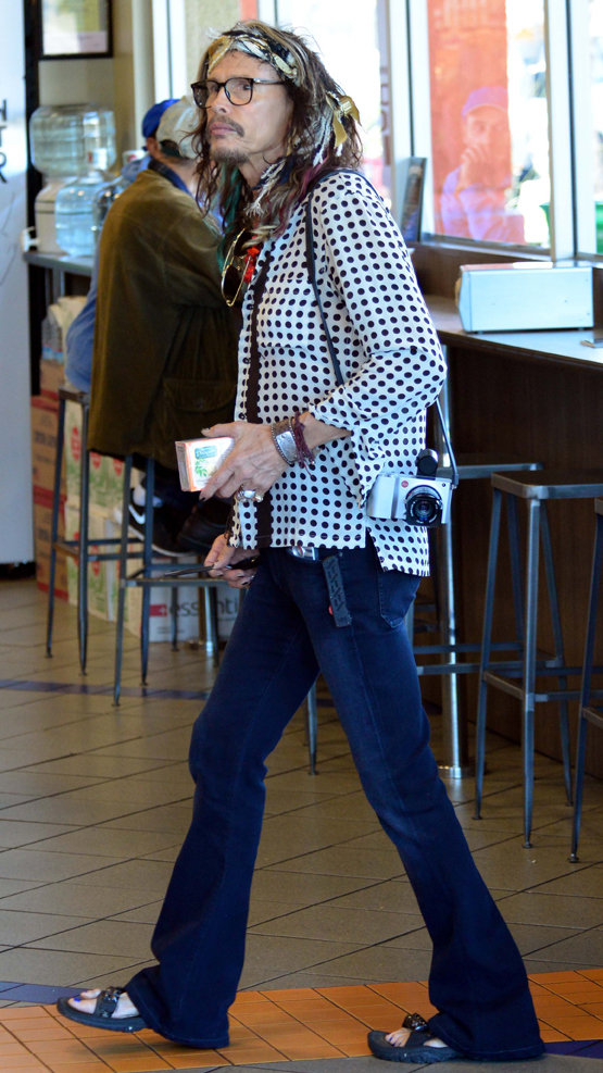 EXCLUSIVE: Aerosmith frontman Steven Tyler dressed as colorful as always as he is spotted shopping at Erewhon Natural Foods Market in Los Angeles, Ca