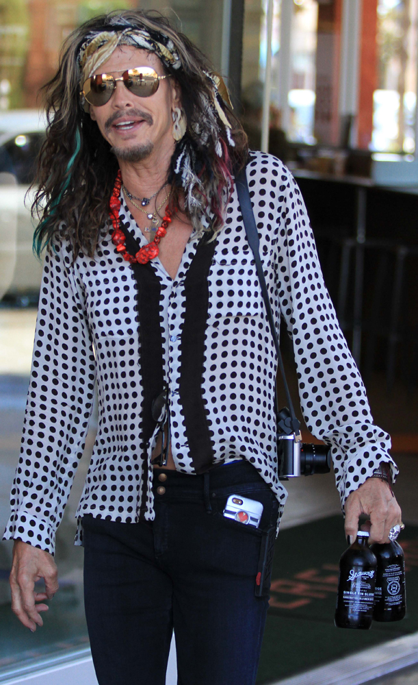 EXCLUSIVE: Aerosmith frontman Steven Tyler dressed as colorful as always as he is spotted shopping at Erewhon Natural Foods Market in Los Angeles, Ca