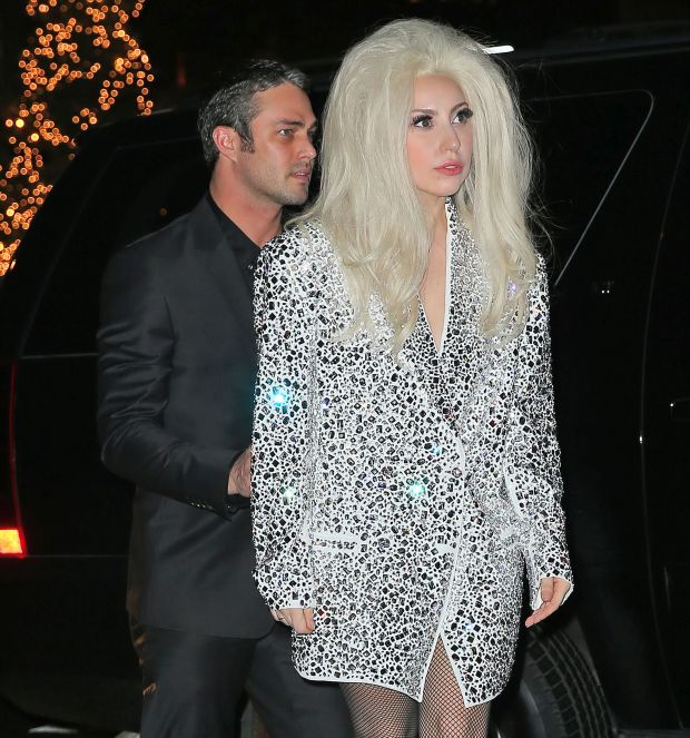 EXCLUSIVE: Rare shot of Lady Gaga and Taylor Kinney together dressed to the nines to see their friend Marina Abramovic's show at the armory in NYC