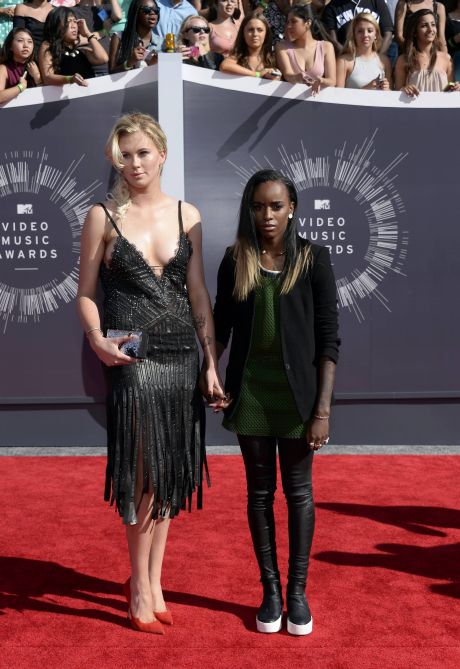 Ireland Baldwin and Angel Haze arrive at the 2014 MTV Music Video Awards in Inglewood