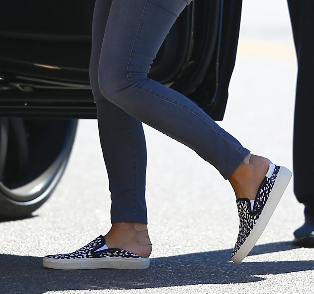 Kim Kardashian seen with band-aids on her heels as she leaves her hotel in La Jolla