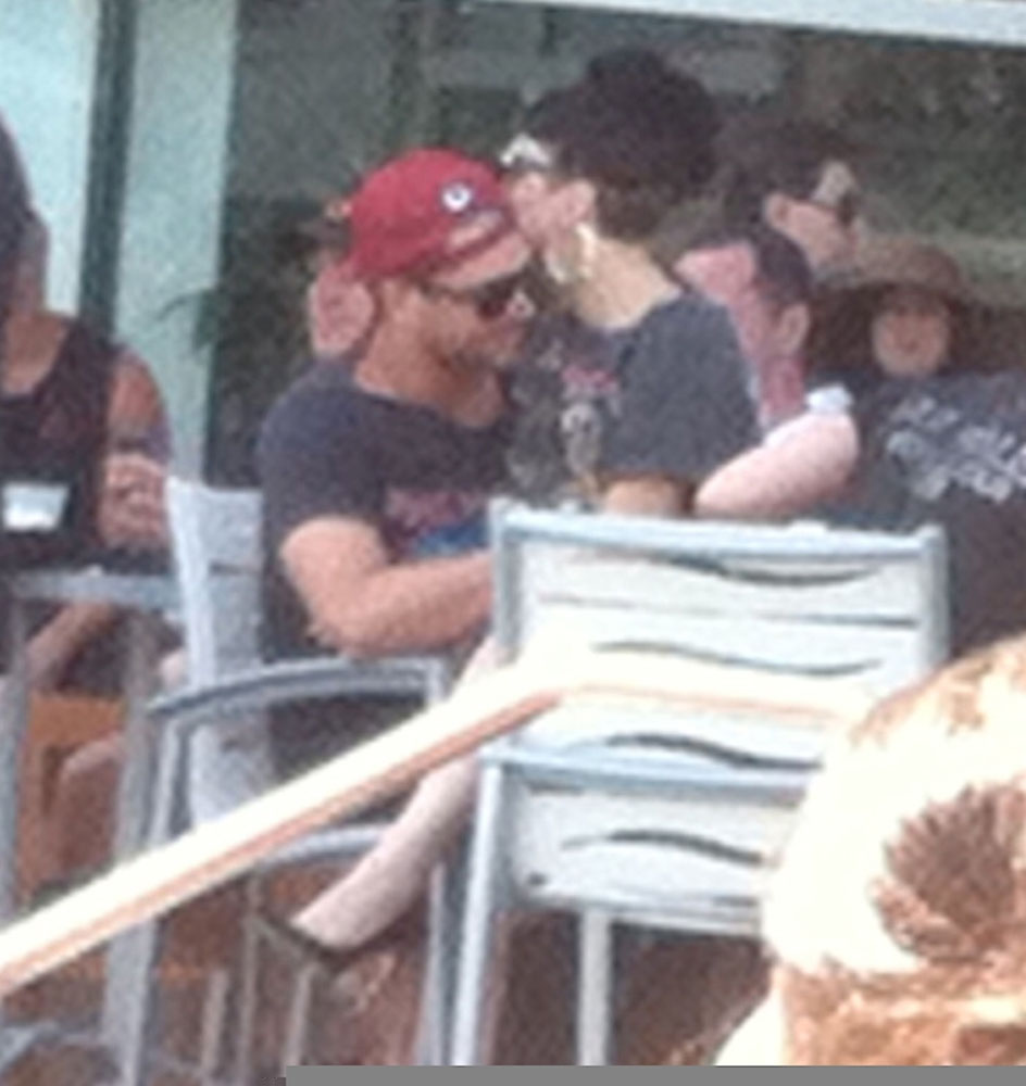 EXCLUSIVE: Lady Gaga cozies up to boyfriend Taylor Kinney poolside in Atlantic City, NJ