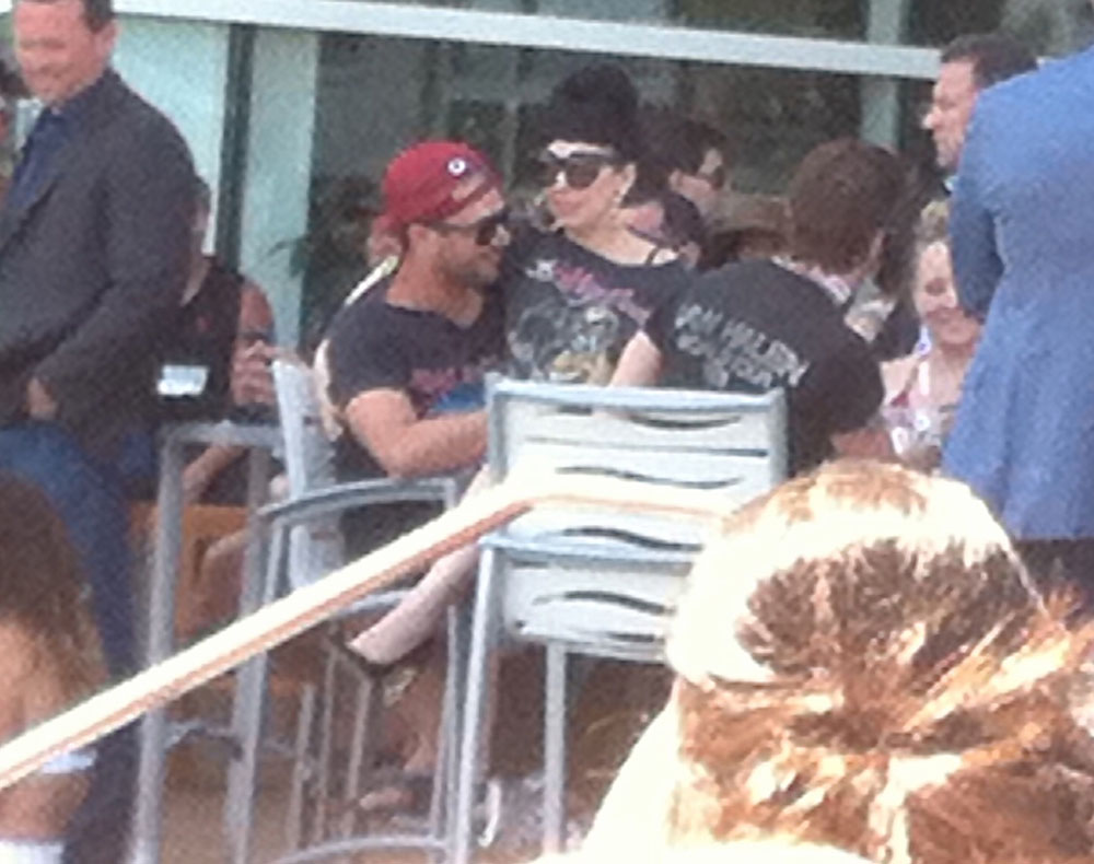 EXCLUSIVE: Lady Gaga cozies up to boyfriend Taylor Kinney poolside in Atlantic City, NJ