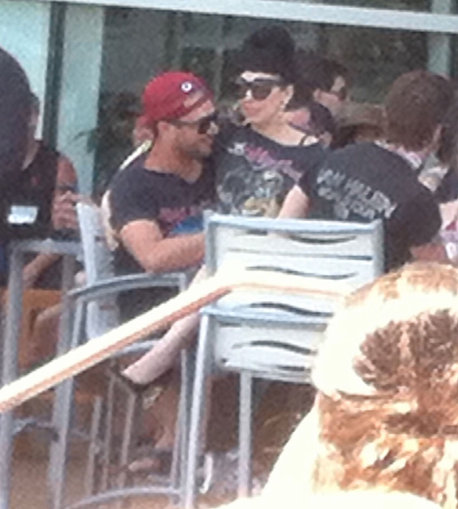 EXCLUSIVE: Lady Gaga cozies up to boyfriend Taylor Kinney poolside in Atlantic City, NJ