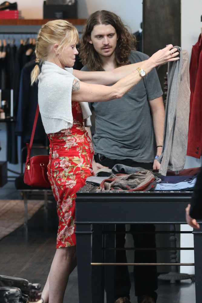 Melanie Griffith and her long-haired son Alexander Bauer were spotted at John Varvatos in Beverly Hills, CA