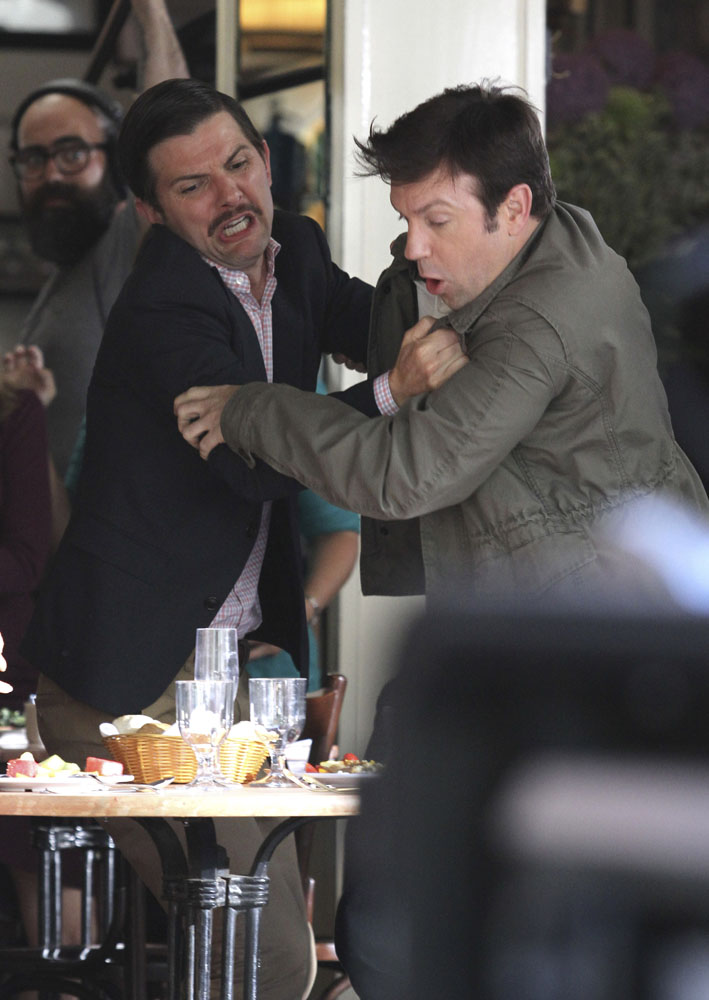 Jason Sudeikis and Adam Scott film a fighting scene at a restaurant for their upcoming movie "Sleeping with Other People" with co-star Amanda Peet in Manhattan, NYC