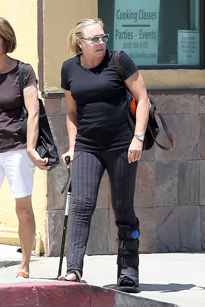 EXCLUSIVE: Charlize Theron's Mom, Gerda limps around after her leg injury