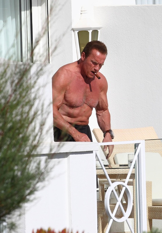 Arnold Schwarzenegger sunbathing in Cannes