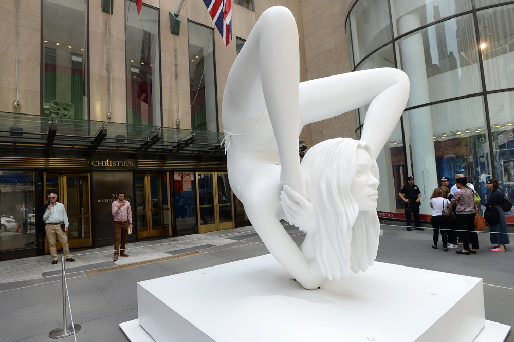 A Kate Moss painted bronze sculpture entitled