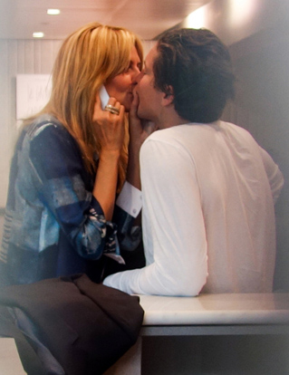 EXCLUSIVE: Heidi Klum and her boyfriend Vito Schnabel share a kiss as the arrive in Nice