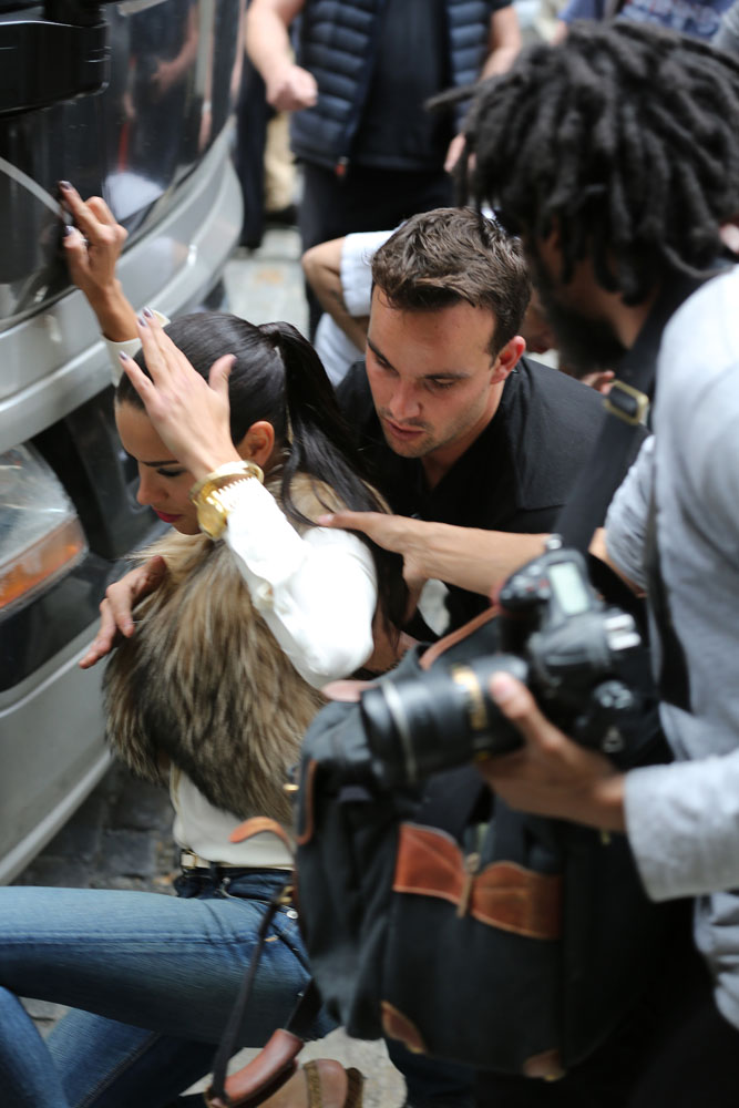 EXCLUSIVE: Adriana Lima bumps her head at a Maybelline photo shoot