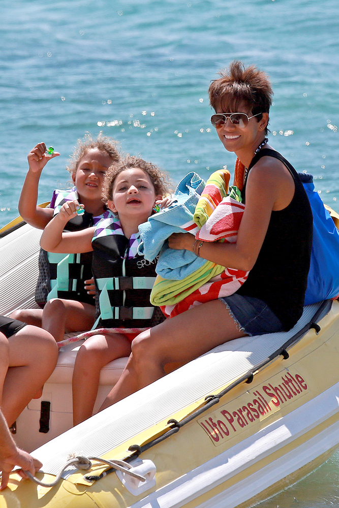EXCLUSIVE: Ha lle Ber ry smiles ear to ear during her Hawaiian Family Vacation