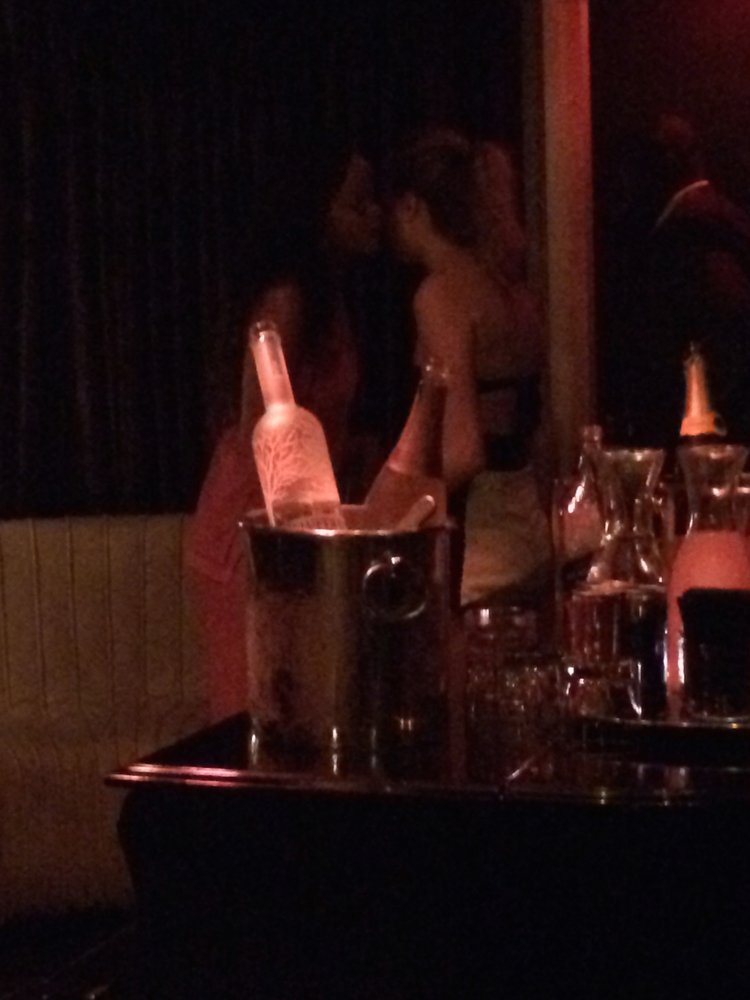 EXCLUSIVE: Rihanna and Cara Delevingne get close in the Dream hotel during Jourdan Dunn's party