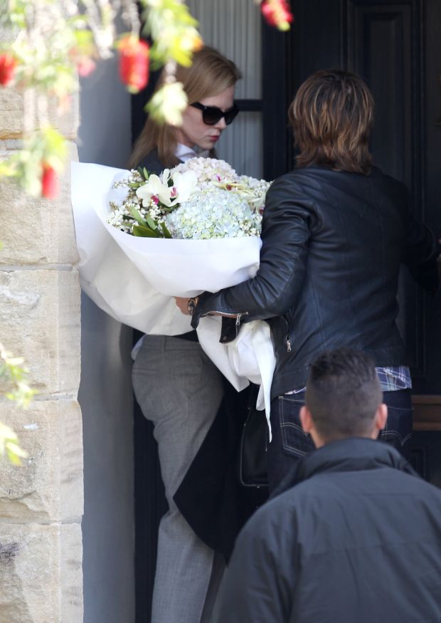 Nicole Kidman and Keith Urban visit with Nicole's mother and bring flowers