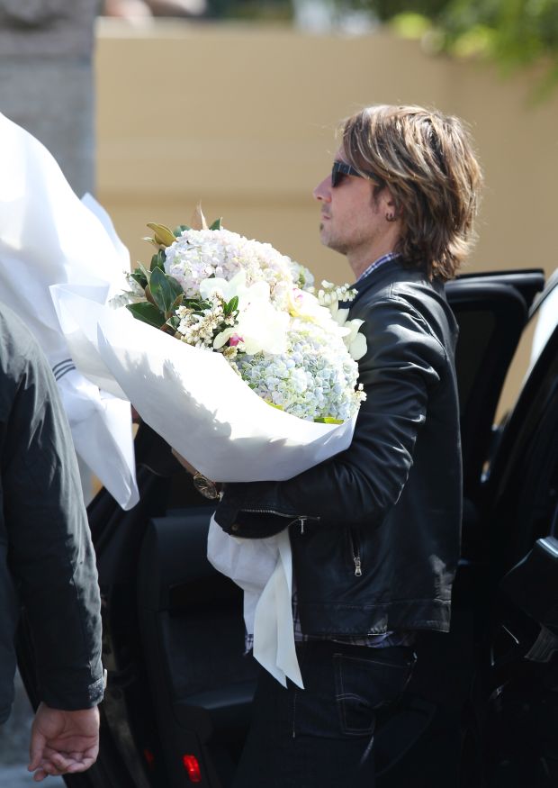Nicole Kidman and Keith Urban visit with Nicole's mother and bring flowers